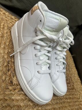 Nike White High-Top Sneakers with Gold Accent